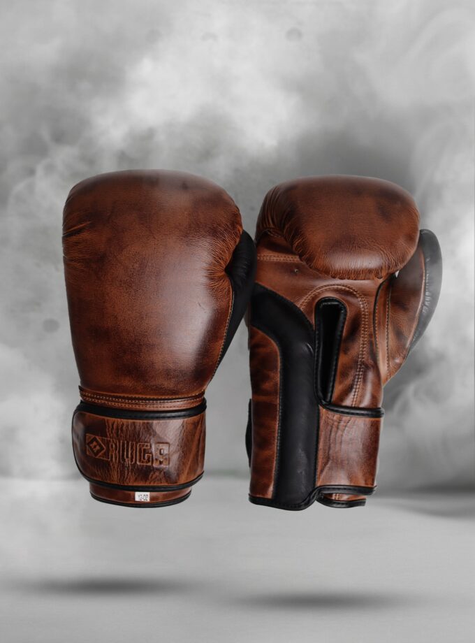 A pair of RUGA Legacy leather boxing gloves in Espresso and Matte Black, featuring a strap lace design.