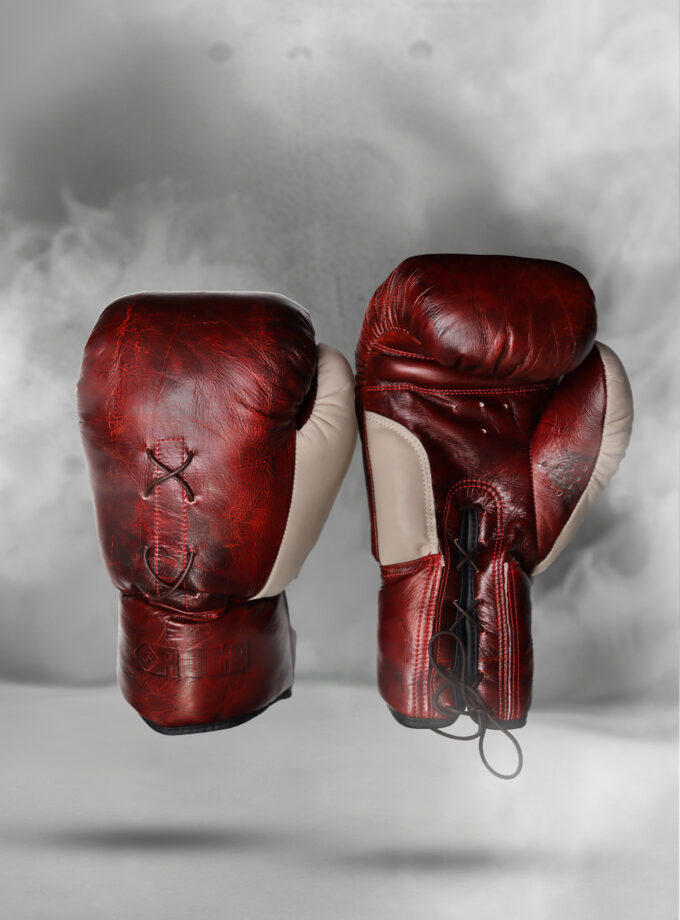 RUGA Legacy Leather Boxing Gloves in Crimson & Ivory laid flat to show both front and back views.