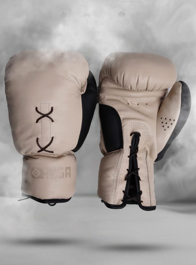 Ivory & Onyx boxing gloves displayed with smoke effect